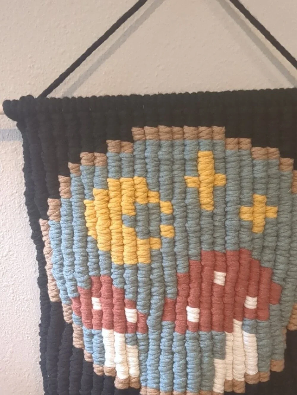 Handmade Black Macrame Wall Hanging with Blue, Yellow, Red Mushroom Design